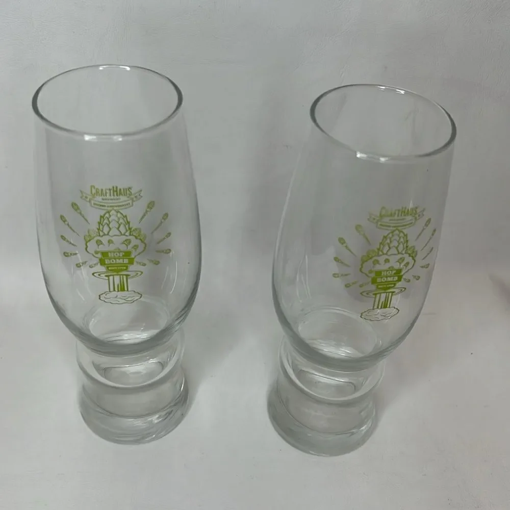 Craft Haus Beer Bomb Glasses 16 Oz Set Of 2 Clear Green Writing 7 1/2 Tall